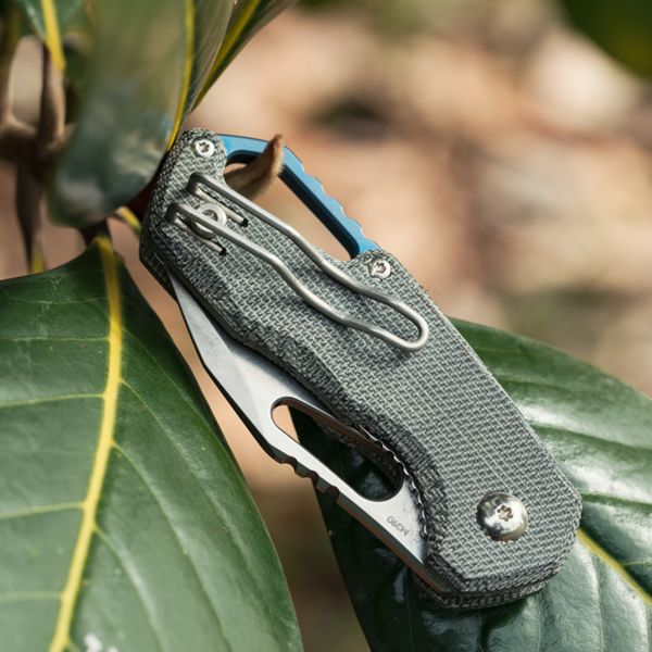 MKM ISONZO – M390 SW CLIP P. bld - BLK CNV MICARTA, BLU Ti SPACER & RING - S/S LINER LOCK & REV. CLIP, THUMB HOLE OPENING +ZIP NYLON POUCH